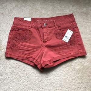 NWT. Terra Cota colored denim shorts.